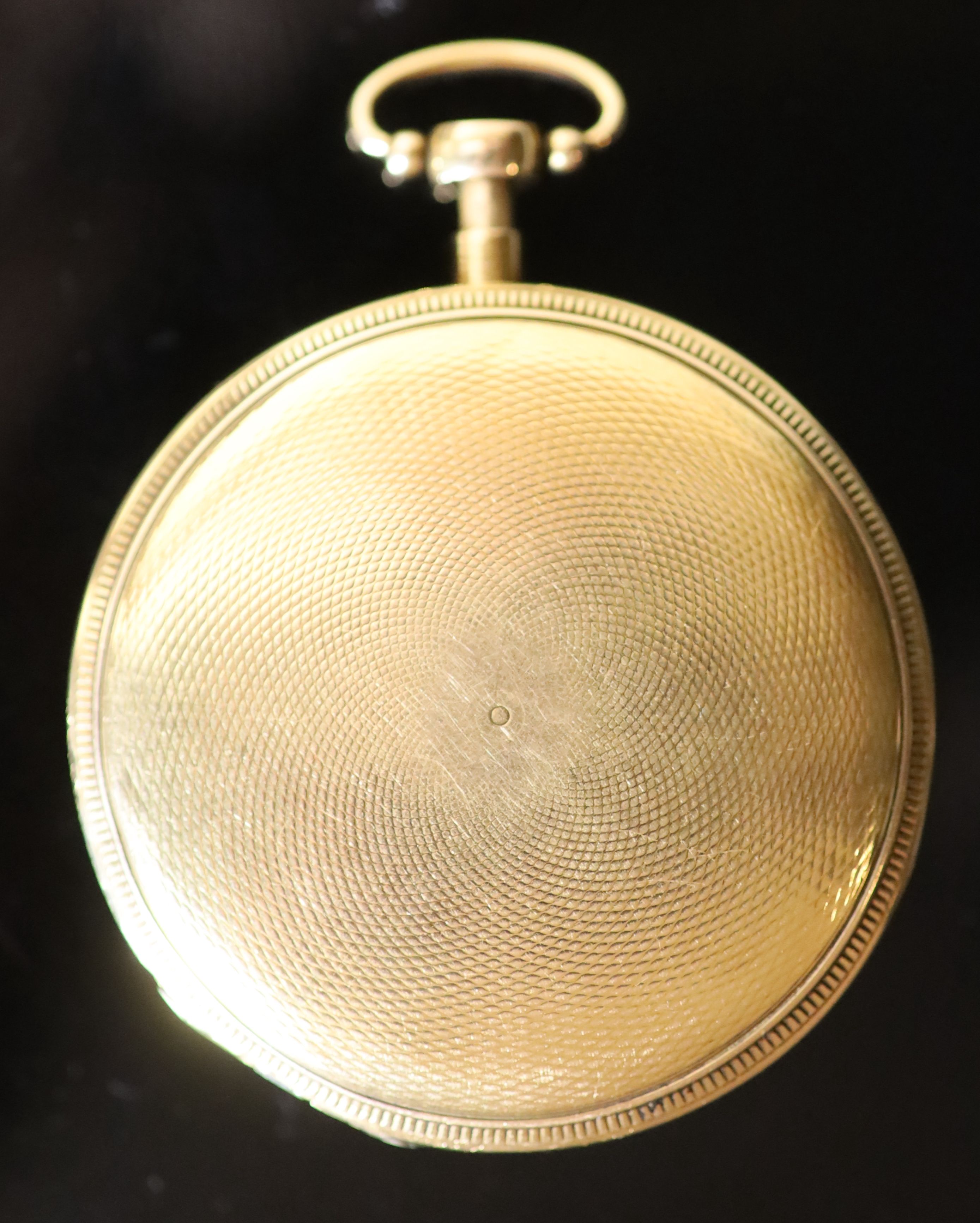 An early 19th century Swiss or French engine turned gold (tests as 18ct) musical open face keywind pocket watch (a.f.),